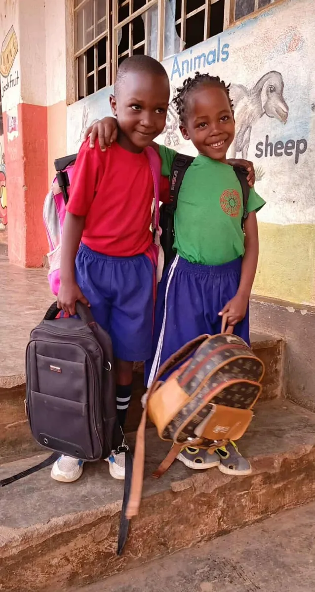 Two students together at Uganda Dream School